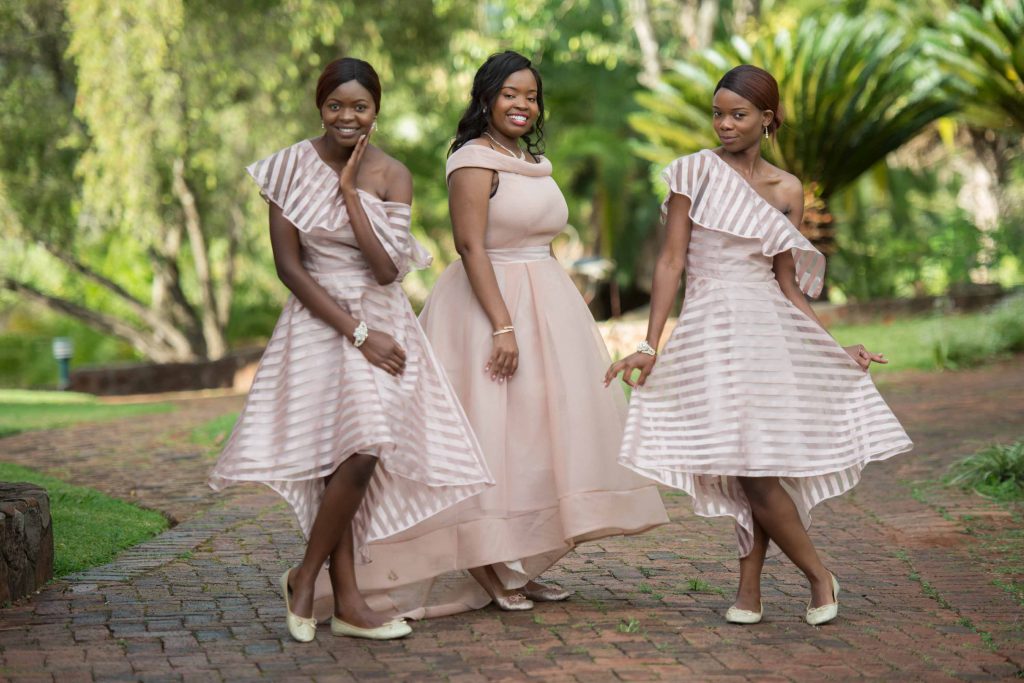 beautiful bridesmaids dresses - kundai mendissa dube and ralph kangai wedding - Real Zimbabwe weddings photos - African Weddings on Wedding Expos Africa