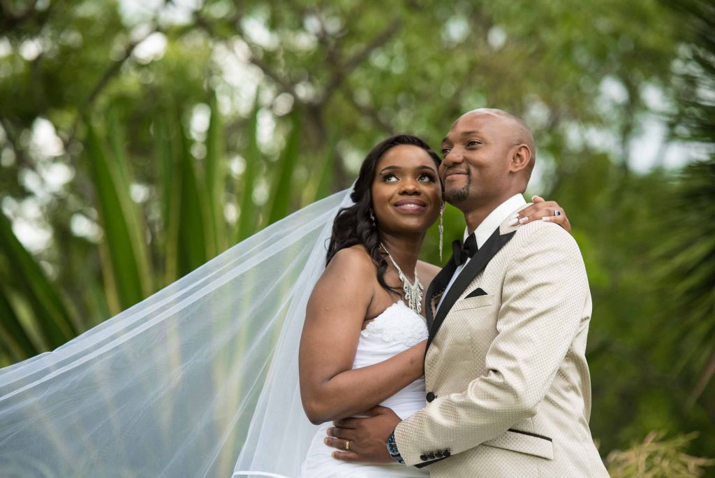 Bride and groom pose for wedding photos - kundai mendissa dube and ralph kangai wedding - Real Zimbabwe weddings photos - African Weddings on Wedding Expos Africa - Ernest Mackina Photography