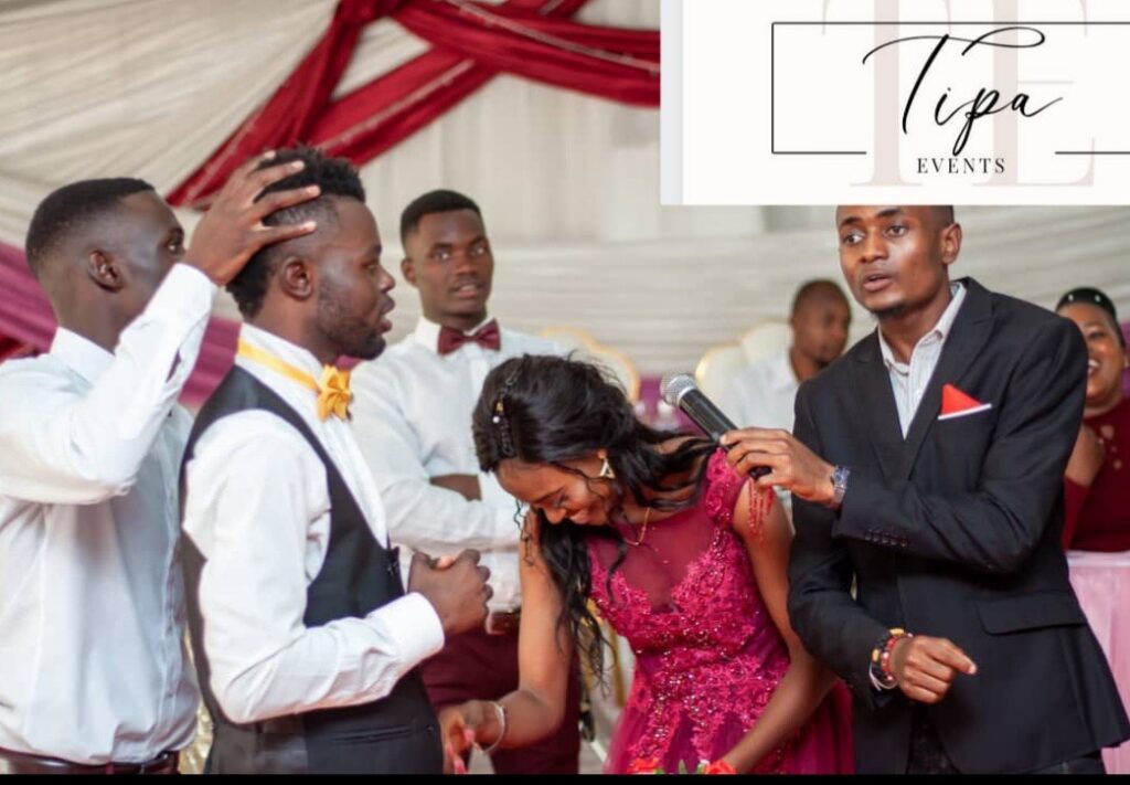 Bride & groom & bridal team dancing at a zimbabwe wedding with MC Anesu | Harare wedding MCs | Master of Ceremony Zimbabwe