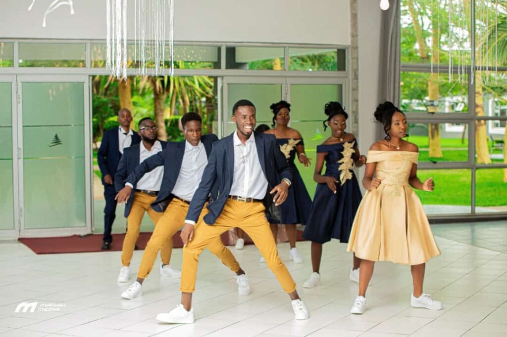Coach Nygee Choreography performing dance choreography with bridal team at a Zimbabwe wedding | Zimbabwe wedding choreography choreographers | Zimbabwe wedding dance masteps | Featured Vendor Fridays 