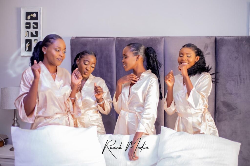 Bridesmaids wearing champagne morning gowns and bridal robes from Minnie Bridal Boutique at a wedding in Harare - Zimbabwe Wedding Dress for sale - Zimbabwe wedding planner - Featured Vendor Fridays - Wedding Expos Africa 