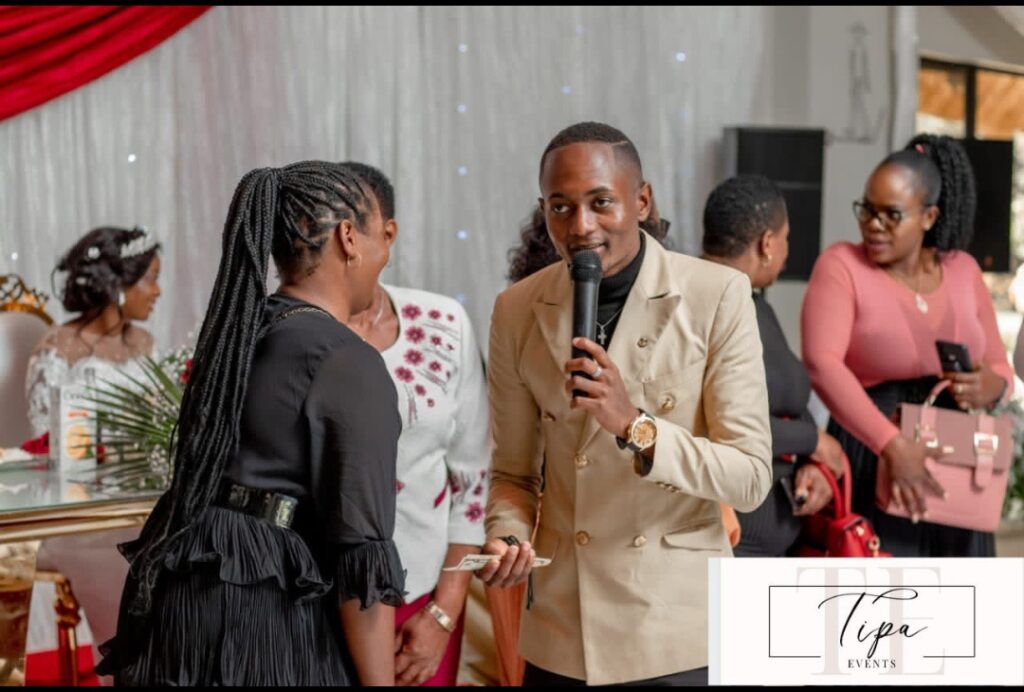 MC Anesu of TIPA Events Management at a wedding in Zimbabwe | Harare wedding MCs | Master of Ceremony Zimbabwe