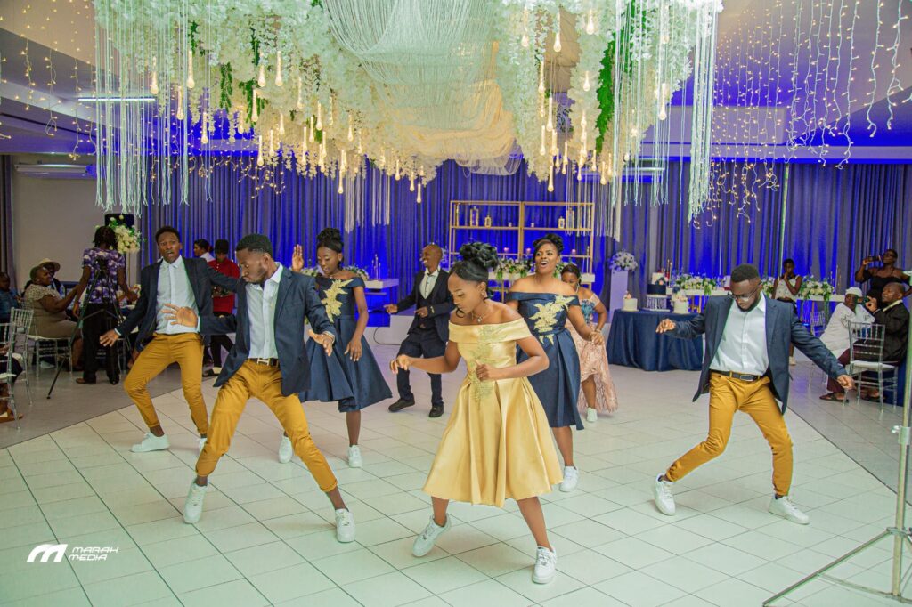 Coach Nygee Choreography performing dance choreography with bridal team at a Zimbabwe wedding | Zimbabwe wedding choreography choreographers | Zimbabwe wedding dance masteps | Featured Vendor Fridays 