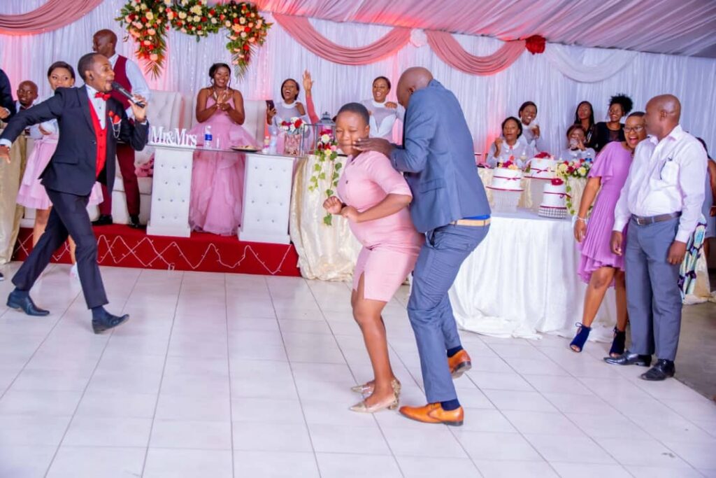 Wedding guests dancing at a zimbabwe wedding with MC Anesu | Harare wedding MCs | Master of Ceremony Zimbabwe