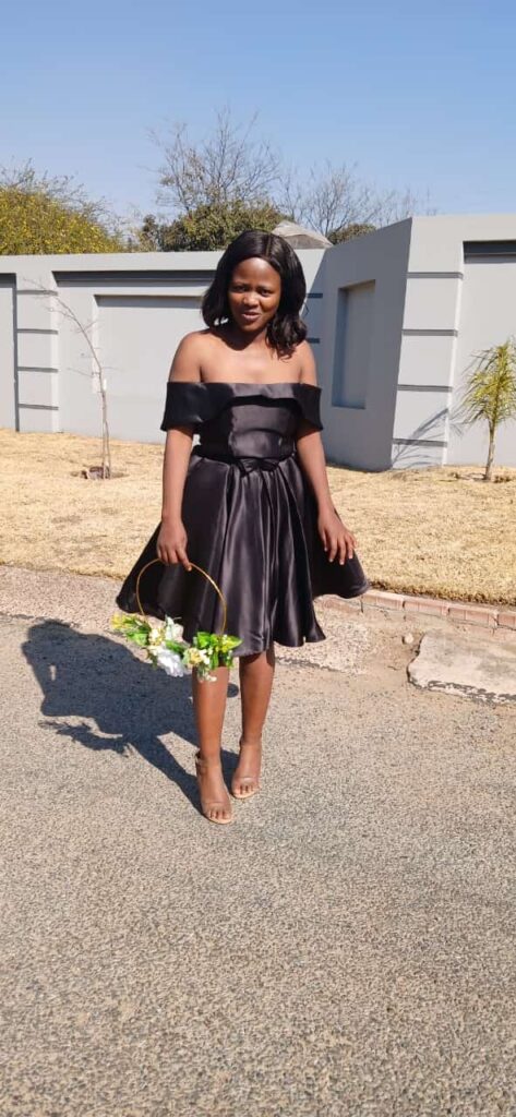 Black bridesmaid dresses for hire at Minnie Bridal Boutique worn by bride and bridal team at a wedding in Harare - Zimbabwe Wedding Dress for hire - Zimbabwe wedding planner - Featured Vendor Fridays - Wedding Expos Africa 