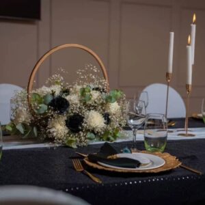 Misrue Events | wooden slates by Misrue at a wedding in Zimbabwe decorated with wedding flower centrepieces on a guest table | Zimbabwe wedding decor | Zimbabwe Wedding Planner Blog 