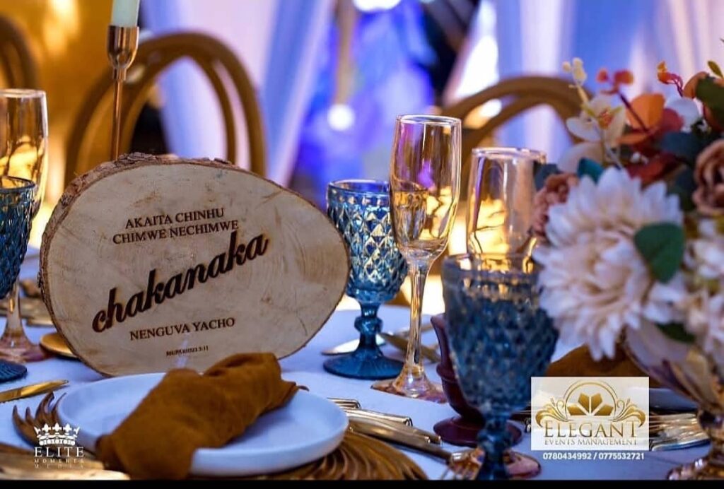 TMisrue Events | Christian Bible verse on a wooden slates by Misrue displayed on a guest table at a wedding in Zimbabwe | Zimbabwe wedding decor | Zimbabwe Wedding Planner Blog 