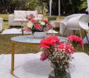 Misrue Events | wedding decor with pink wedding flower bouquet Centrepieces by Misrue at a wedding in Zimbabwe on a guest table | Zimbabwe wedding decor | Zimbabwe Wedding Planner Blog 