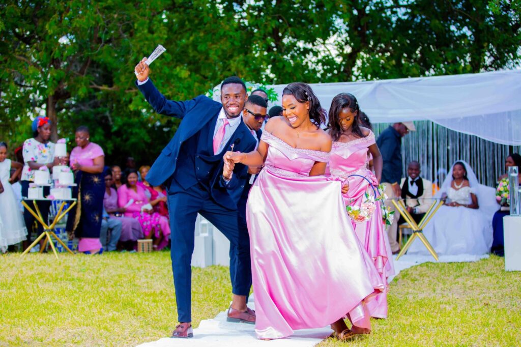 Coach Nygee Choreography performing dance choreography with bridal team at a Zimbabwe wedding | Zimbabwe wedding choreography choreographers | Zimbabwe wedding dance masteps | Featured Vendor Fridays 