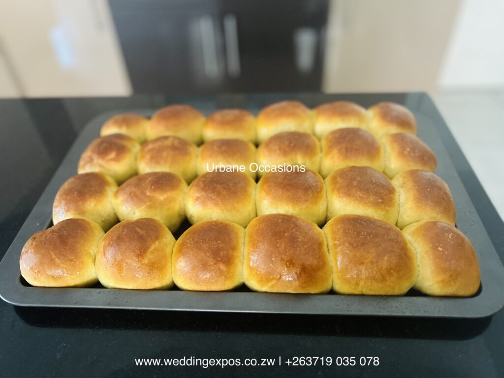 Zim buns coated with sugar syrup | Yeast Dinner Rolls | Zimbabwe Catering ​