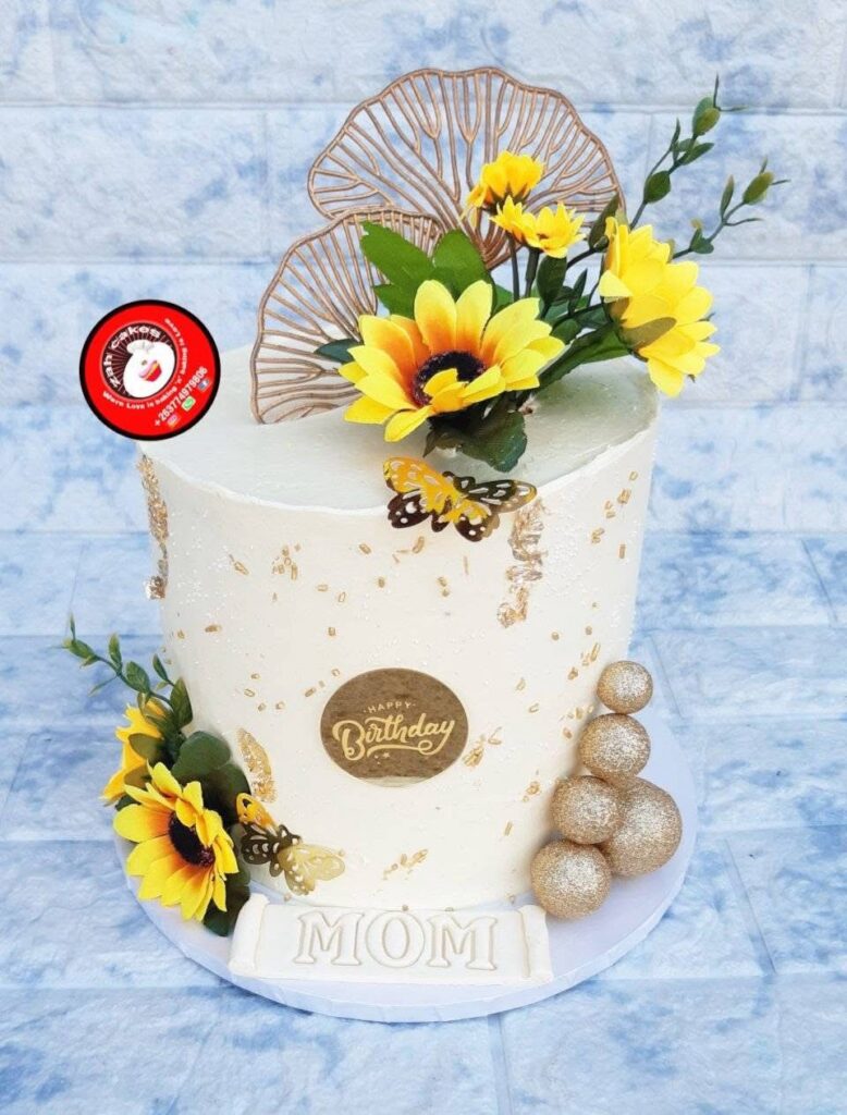 Yellow and gold sunflower themed birthday cake for a woman by Zah Cakes- Bulawayo birthday cakes - Zimbabwe wedding cakes - featured vendor Fridays